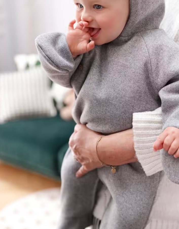 Combi-pilote en drap de laine bébé fait partie des indispensables bébé hiver